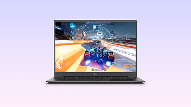 This image shows a laptop displaying a fast-paced racing game on its screen, set against a soft gradient background, alongside the text “More games, more fun,” highlighting Windows’ wide library of game titles.