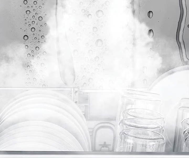LG dishwasher interior showing plates and glasses cleaned with steam to illustrate efficient washing performance