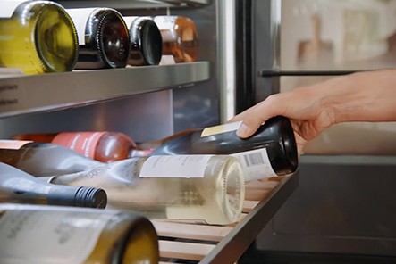 Matt Abdoo, chef and owner at pig beach, is opening the door of LG SIGNATURE Wine Cellar.