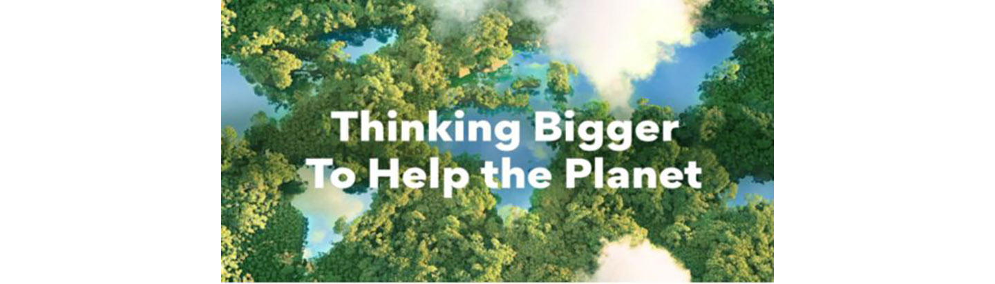 An Aerial Photo of a forest with lakes representing the world’s continents and the phrase 