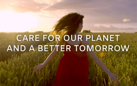 A girl in a red dress running through a field with the phrase 