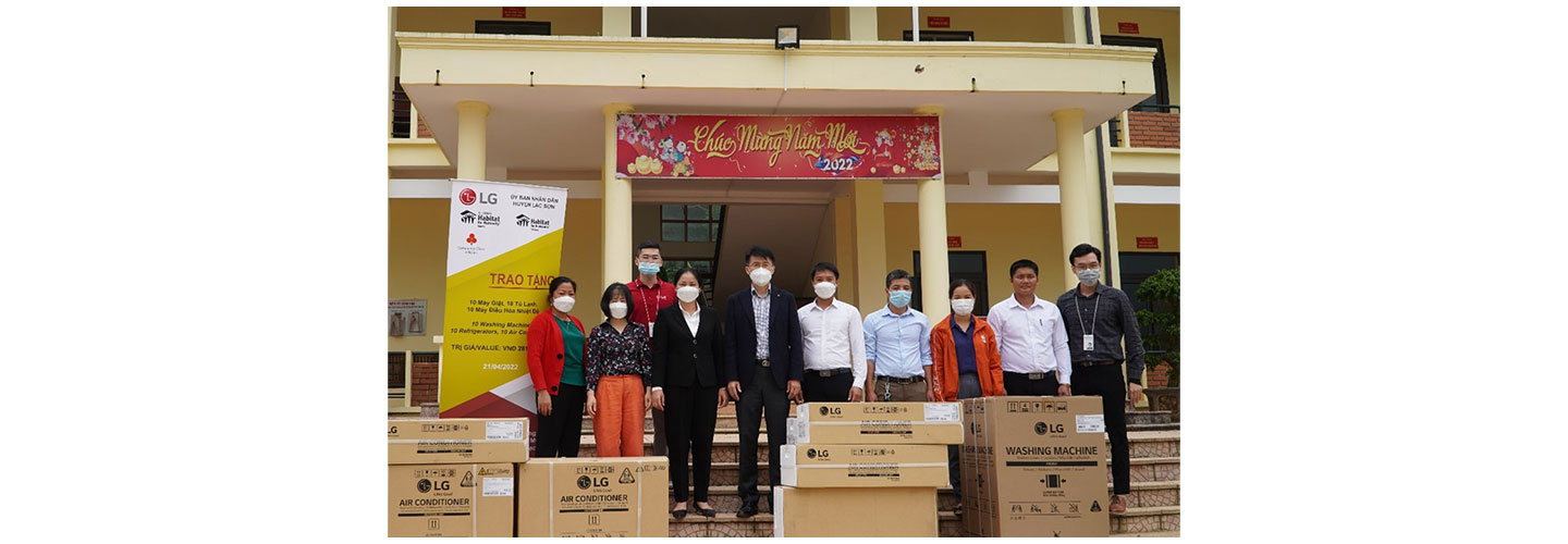 A photo taken at the project's opening ceremony with donated household appliances from LG