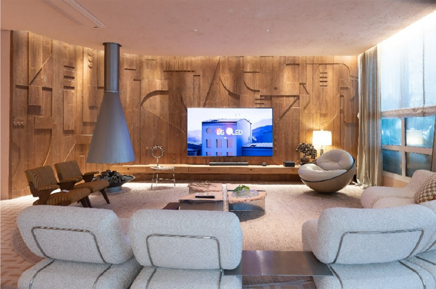 A living room-like setting with LG OLED M3
