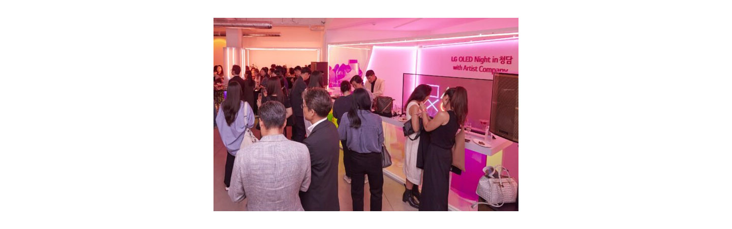 LG OLED Night in Cheongdam at Artist Company's headquarters, with many people enjoying the night with champagne