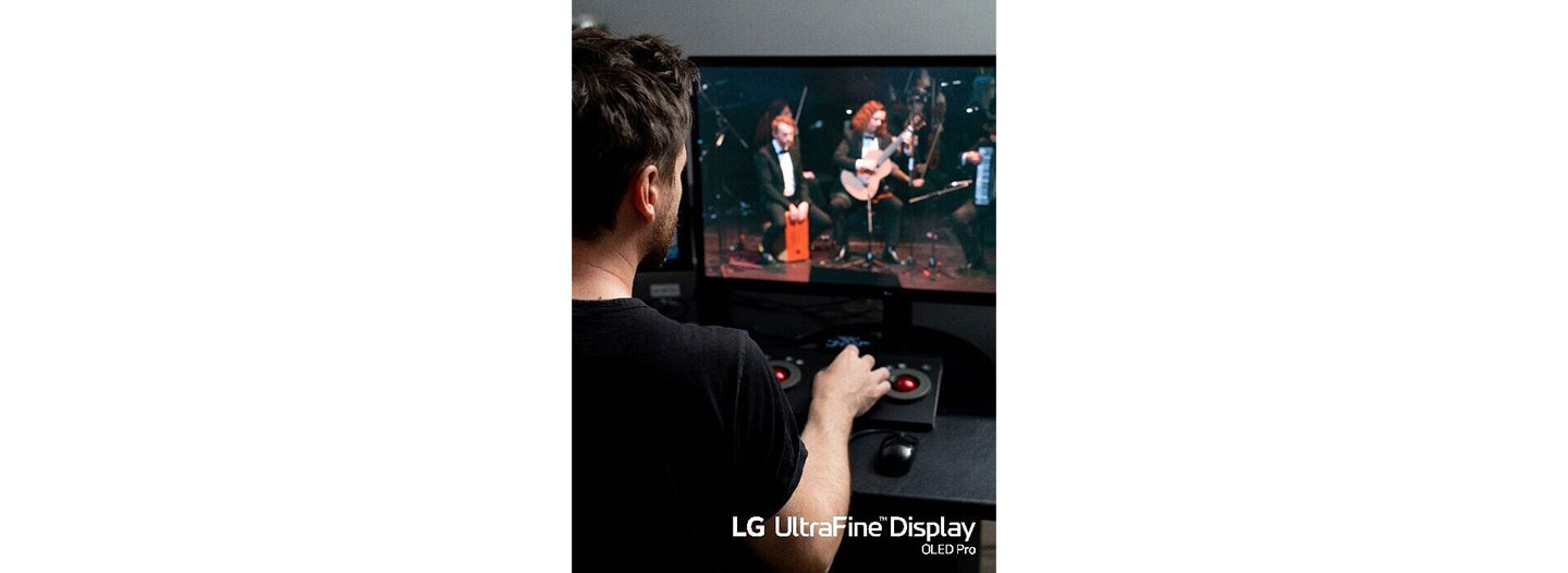A man working on LG UltraFine Display OLED Pro