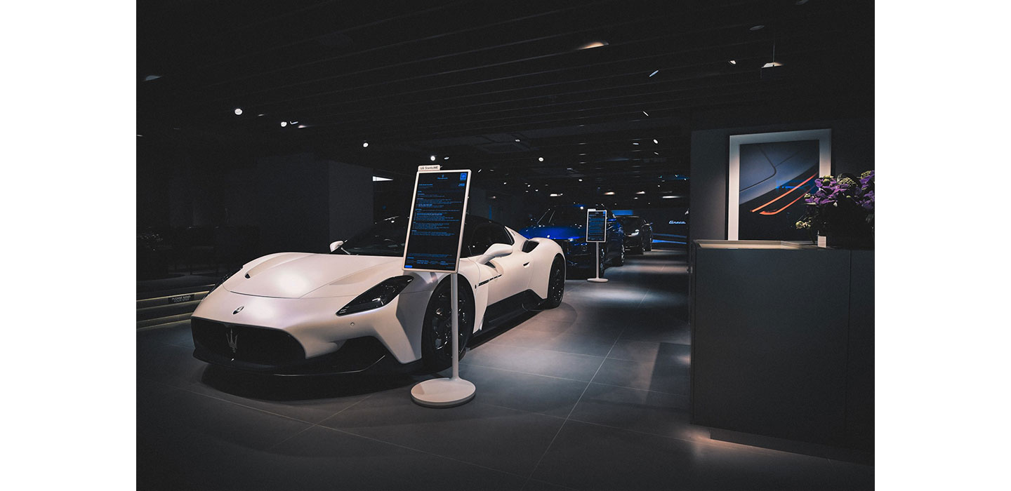 LG StanbyME installed next to the Maserati's luxurious automobile at Maserati showroom in Hong Kong