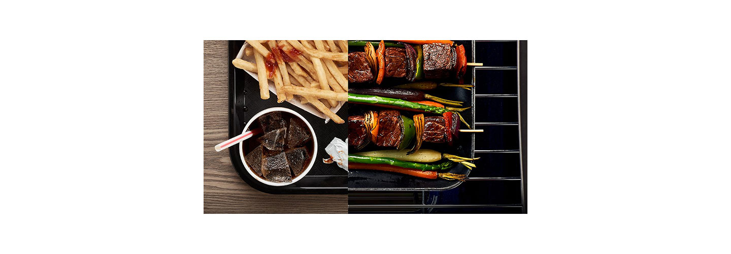 An image comparing a dull fast food meal with a fresh grilled shish kebab mixed with colorful, healthy fruit and vegetables
