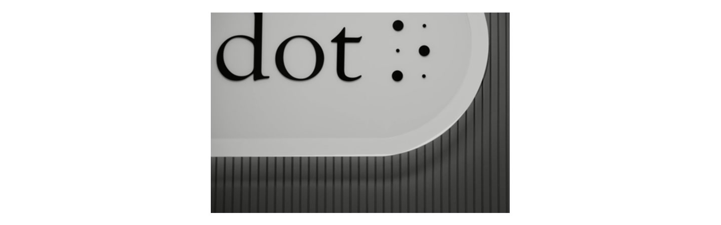 The logo of Dot Inc. displayed in their office.