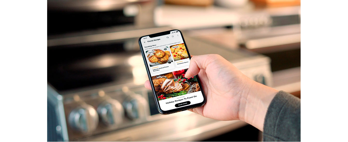 LG appliance user scrolling down the ThinQ Recipe with the smartphone