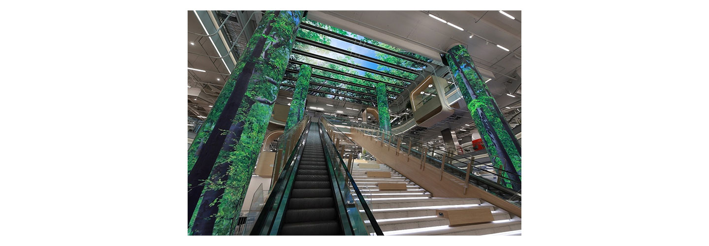 LG’s LED signage expressing images of a forest on the ceiling and pillars of Bangkok’s True Digital Park West.