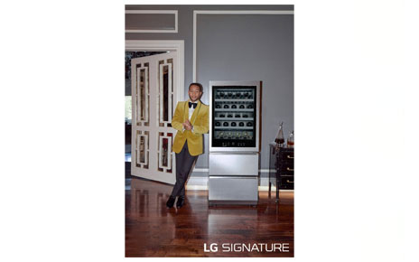 An image of John Legend leaning against LG SIGNATURE Wine Cellar
