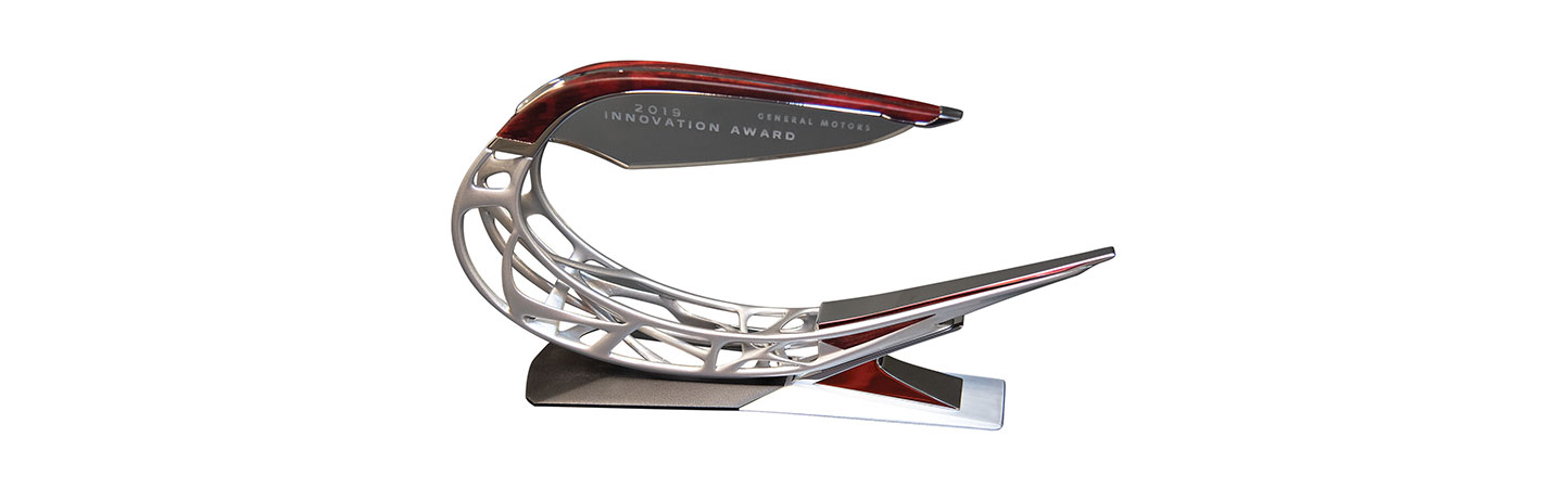 A close-up of the trophy, with the GM Innovation Award logo displayed