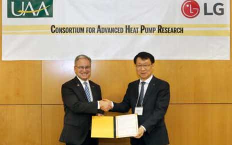 At the ceremony for the consortium for advanced heat pump research in Alaska, Thomas Yoon (CEO of LG Electronics North America), Sean Parnell (chancellor of the University of Alaska Anchorage), and James Lee (head of the Air Solution Business Unit at LG Electronics) are standing next to each other from left to right