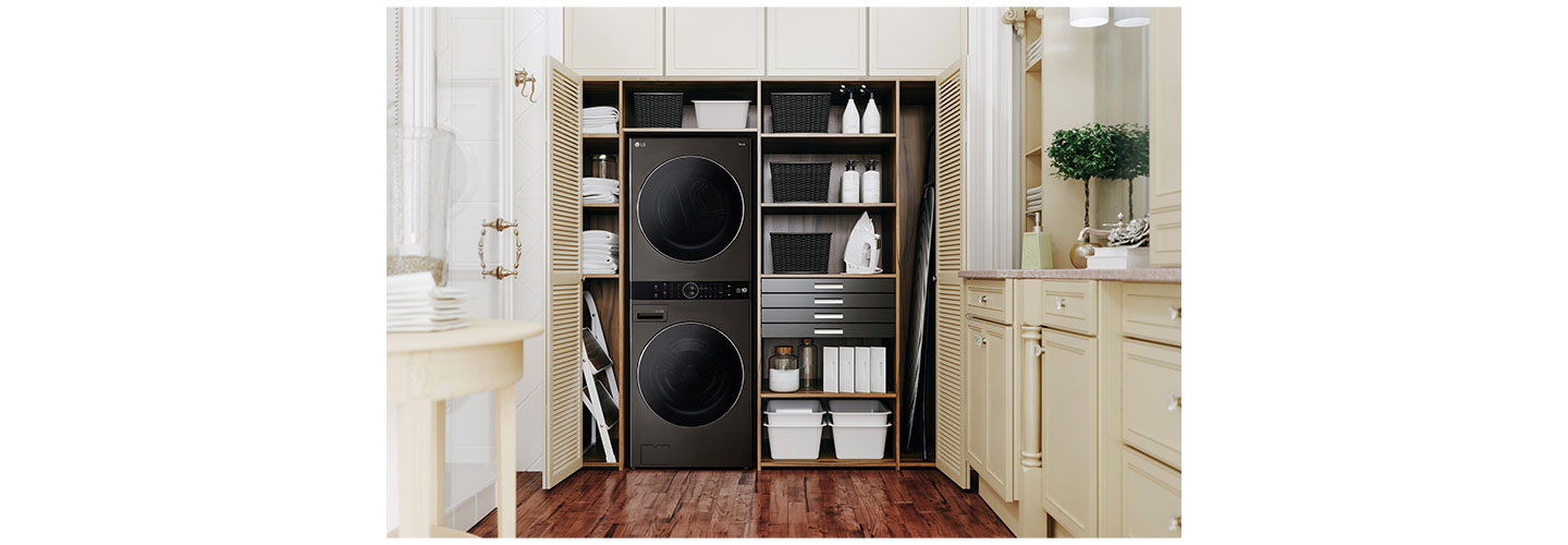 LG WashTower with Black Steel finish fitted inside a bright laundry room, delivering a minimalist and ultra-modern aesthetic.