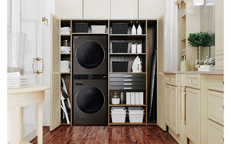 LG WashTower with Black Steel finish fitted inside a bright laundry room, delivering a minimalist and ultra-modern aesthetic.