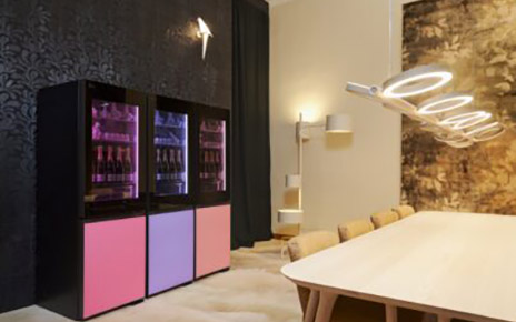 A photo of the LG x Moooi showroom showcasing InstaView bottom-freezer refrigerator with MoodUP