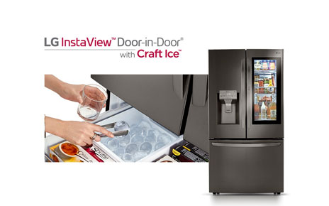 Front view of LG InstaView™ Door-in-Door® showing its inside through the InstaView becoming transparent with a close-up view of a user taking out Craft Ice™ from a drawer.