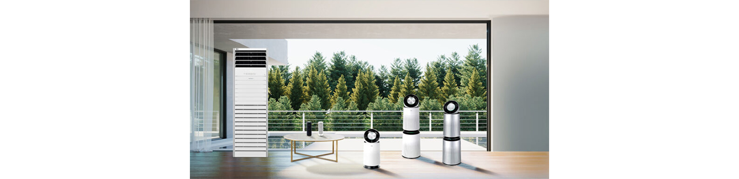 A whole lineup of LG PuriCare, including the big capacity commercial model, PuriCare Mini air purifiers, PuriCare 360 models and PuriCare Pet, standing in a living room with a green scenery