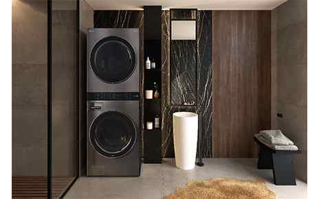 LG WashTower™ is located in the laundry room beside the narrow shelf.  