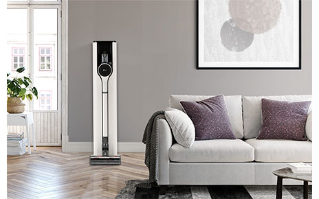 CordZero A9 Kompressor+ is placed on a charging station in the livingroom