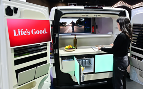 A photo of a woman experiencing the Spielraum concept car at the 2025 Seoul Mobility show