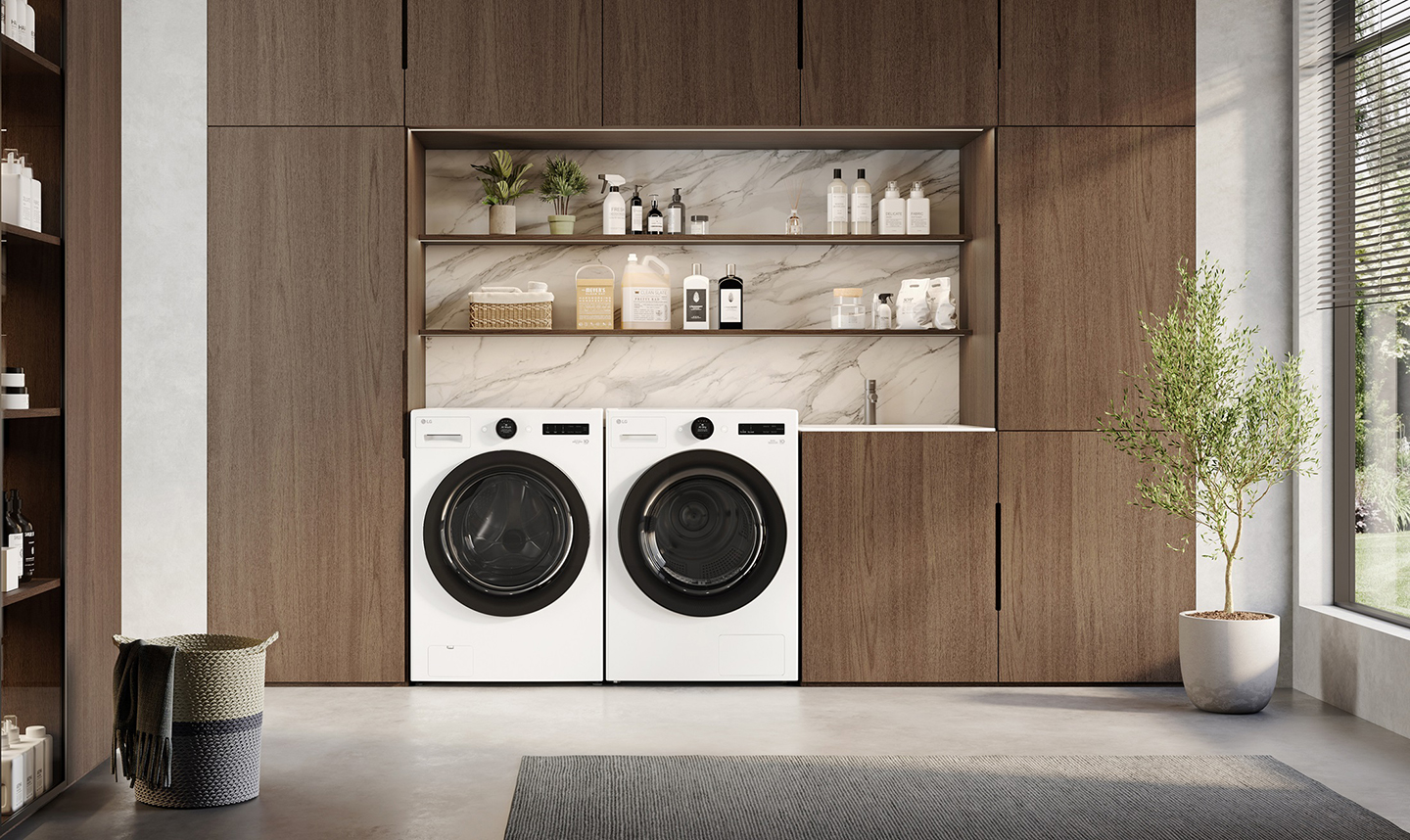 A photo of the new washer and dryer pair set up in a utility room