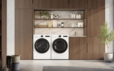 A photo of the new washer and dryer pair set up in a utility room