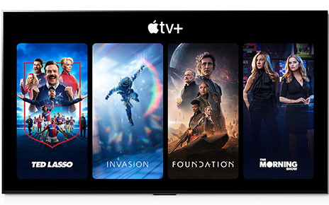 The home screen of Apple TV+ with various Apple TV+ shows displayed including Ted Lasso and Invasion