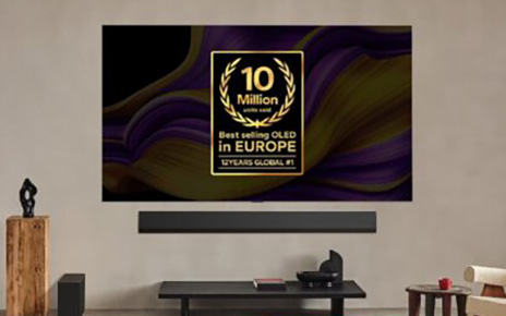 A wall-mounted LG OLED TV screen showcases the milestone: '10 Million Units Sold - Best Selling OLED in Europe.'