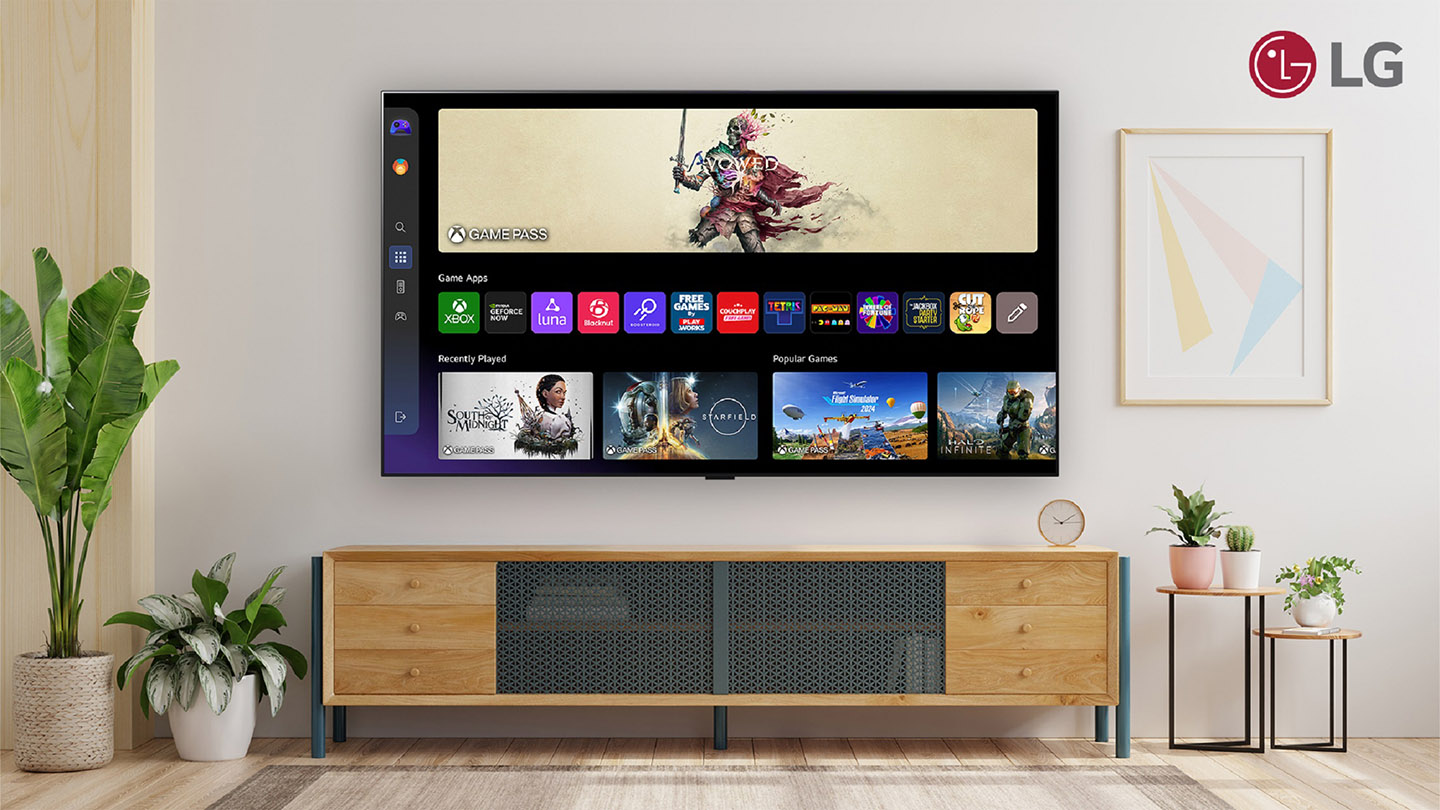 A wall-mounted LG Smart TV displays the cloud gaming interface in a comfortable living room setting.