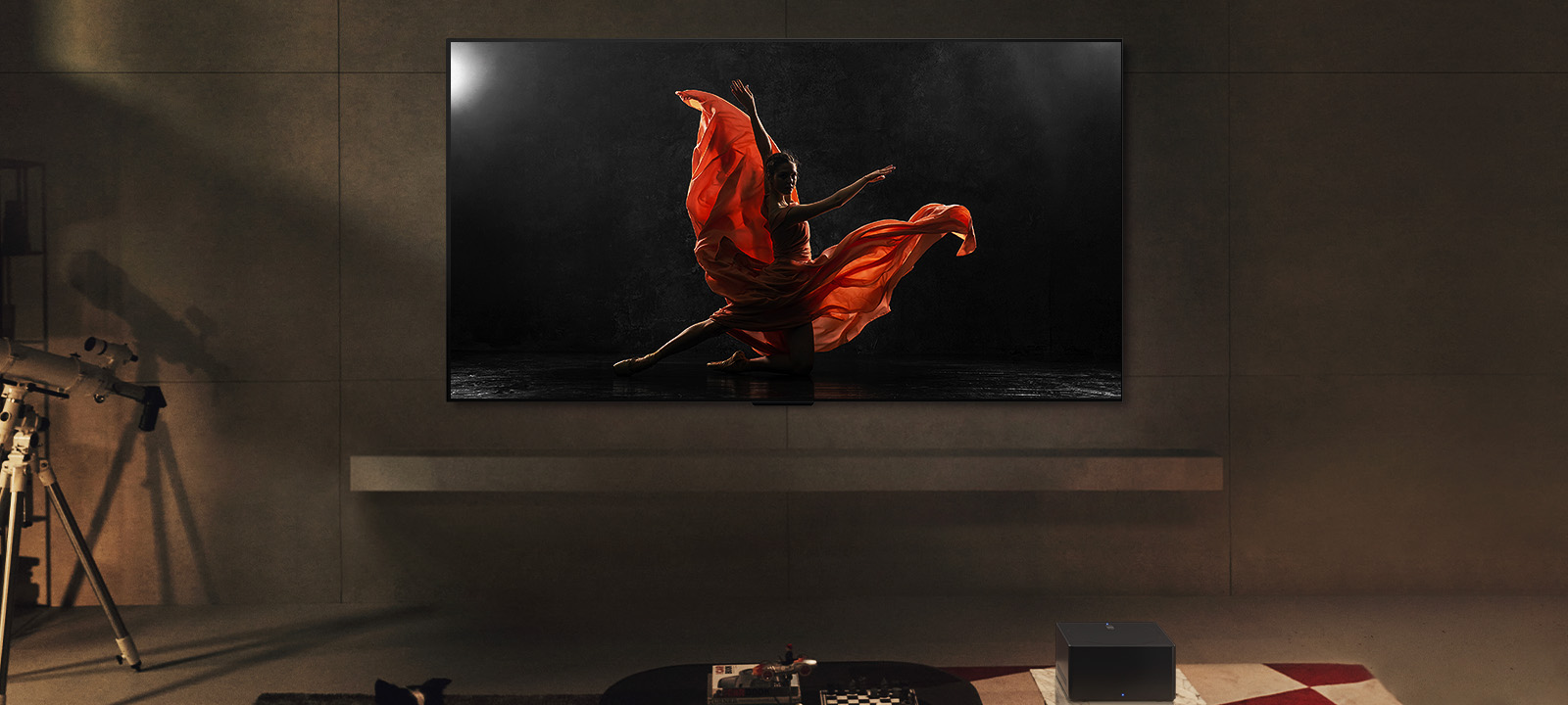 LG SIGNATURE OLED M4 and LG Soundbar in a modern living space in nighttime. The screen image of a dancer on a dark stage is displayed with the ideal brightness levels.