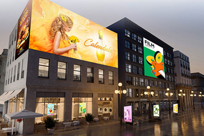 This image depicts various signage products installed outdoors, each showing different content.
