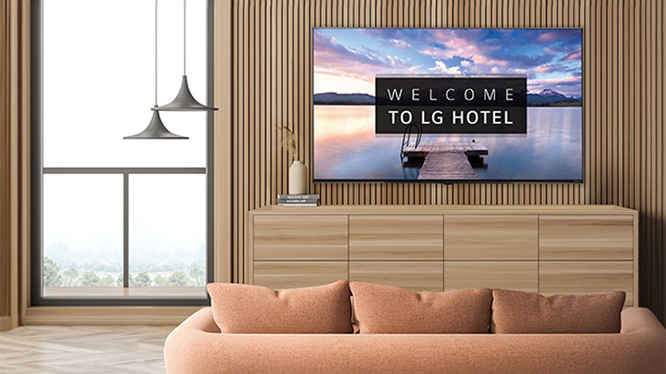 An LG commercial TV is installed in a hotel room.