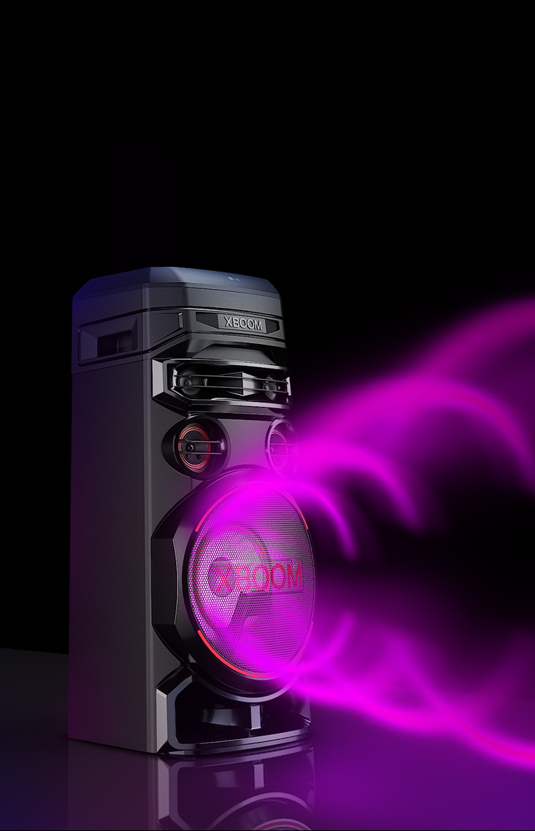 LG RNC7  LG XBOOM RNC7 with a left side forward against a black background. The purple circular sound graphic comes out from the woofers.
