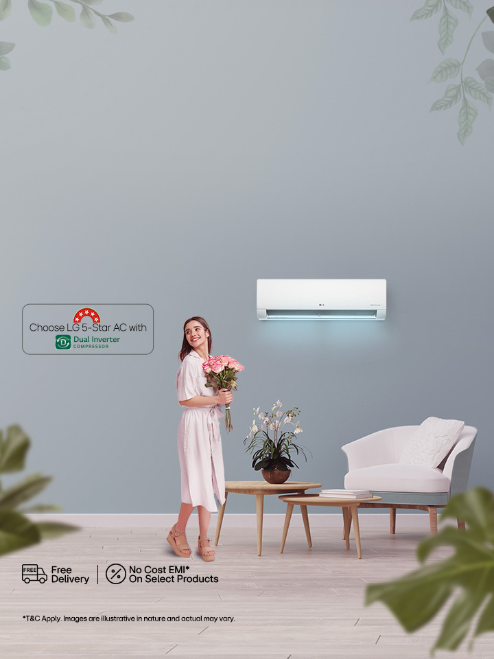 A female enjoying LG AC with five star energy rating designed to reduce power consumption during regular use