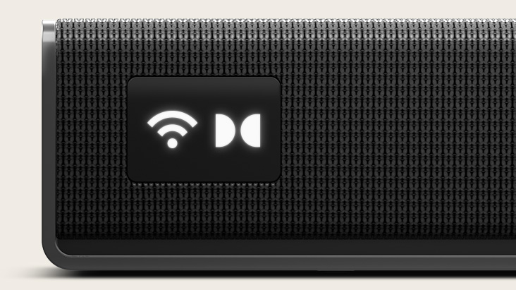 Close-up of the LG Sound Suite H7 soundbar featuring a smart OLED display for control, with Wi-Fi and Dolby Atmos icons.	