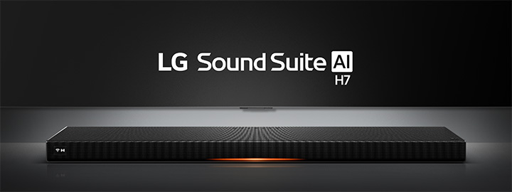 LG Sound Suite H7 soundbar with a slim, sleek black design displayed on a surface under a spotlight