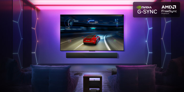 LG OLED M5 TV with a game being played on its screen showcasing the smooth and seamless gameplay. Zero Connect Box is seen, but blends well with the space. Nvidia G-Sync logo and AMD FreeSync Premium logo are seen. Gaming certifications are visible. 