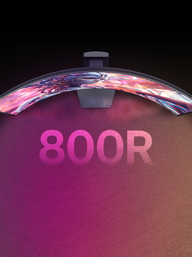 LG curved monitor wrapping a wide screen across the desk illustrates immersive curvature.