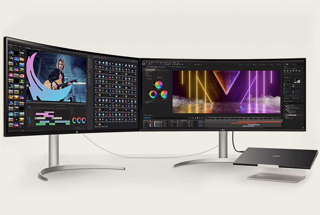 LG monitor setup linking a laptop and dual displays on one desk illustrates Daisy Chain multitasking.