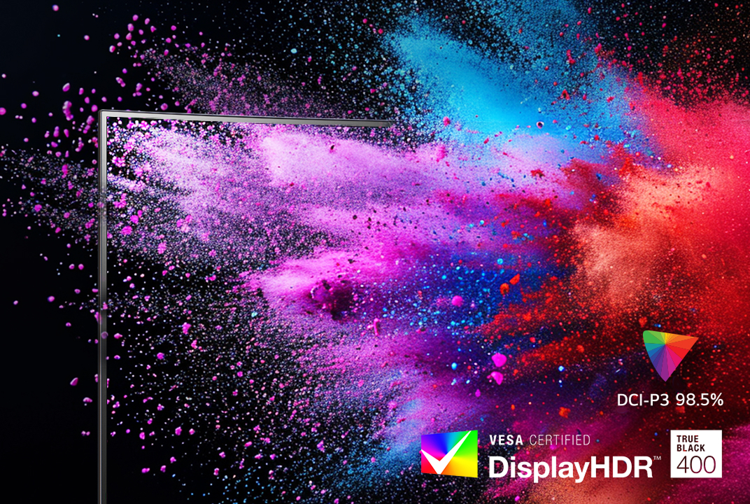 LG monitor showing vivid pink and blue powder bursts with DisplayHDR 400 and DCI-P3 labels illustrates HDR brightness and color range.