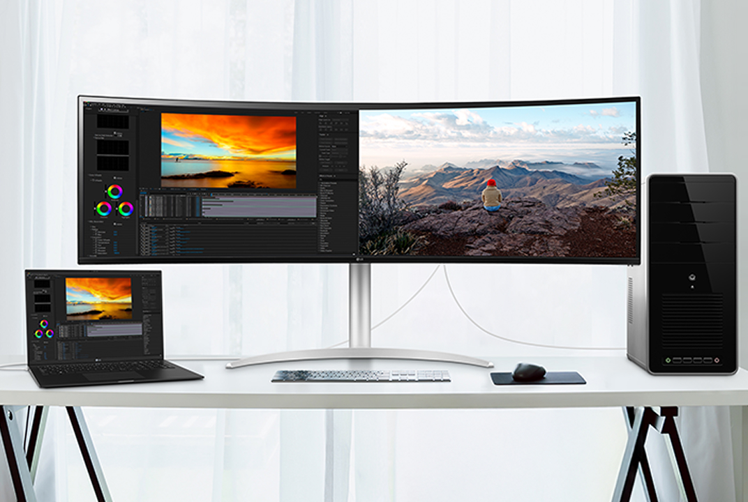 LG monitor setup sharing one keyboard and mouse across devices illustrates KVM control.