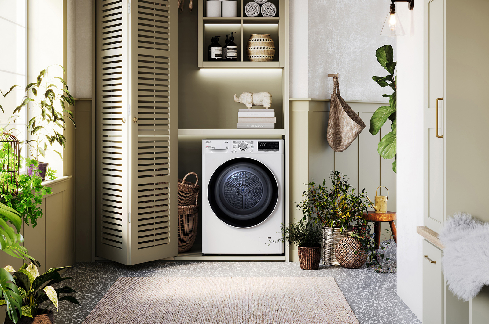 The white LG 9kg dryer FDV709W, featuring a distinctive black porthole ring, shown installed in a stylish, modern laundry closet.