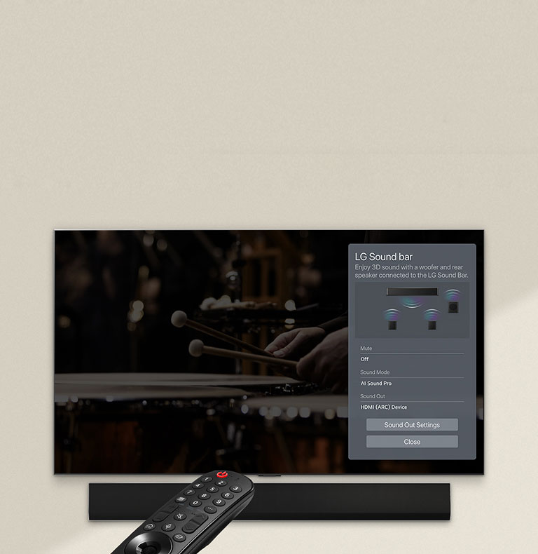 An image of a remote control pointed at an LG OLED TV showing soundbar control settings on the right side of the screen.