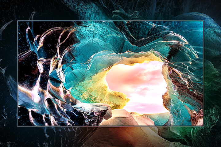 LG OLED M5 TV screen showing a cave interior looking out to the sky. Detail is impressive showing visually lossless 4K quality.