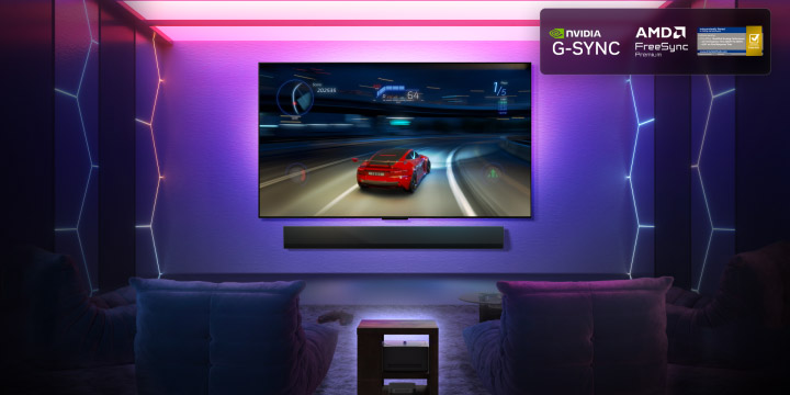 LG OLED M5 TV with a game being played on its screen showcasing the smooth and seamless gameplay. Zero Connect Box is seen, but blends well with the space. Nvidia G-Sync logo, AMD FreeSync Premium logo and Intertek certification for 0.1ms response time are seen. Gaming certifications are visible.