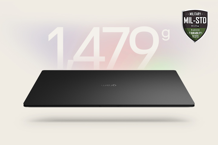 An animation showcasing a lightweight laptop with '1,479g' displayed in the first frame and '14.5mm' thickness in the second frame. Both frames include the MIL-STD durability badge, emphasising portability and durability.