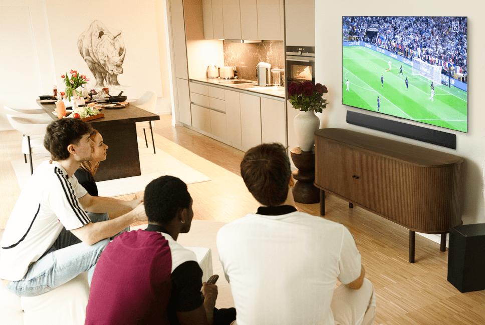 Janis Danner is watching a football game with her friends on her LG OLED G4 TV.