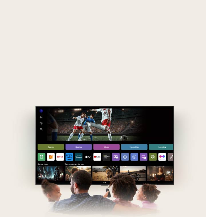 Family of four is gathered around an LG AI TV. A circle appears around the person holding the remote showing their name. This showcases how AI Voice ID recognizes each user's voice signature. The webOS interface then shows how the AI automatically switches the account and recommends personalized content. 