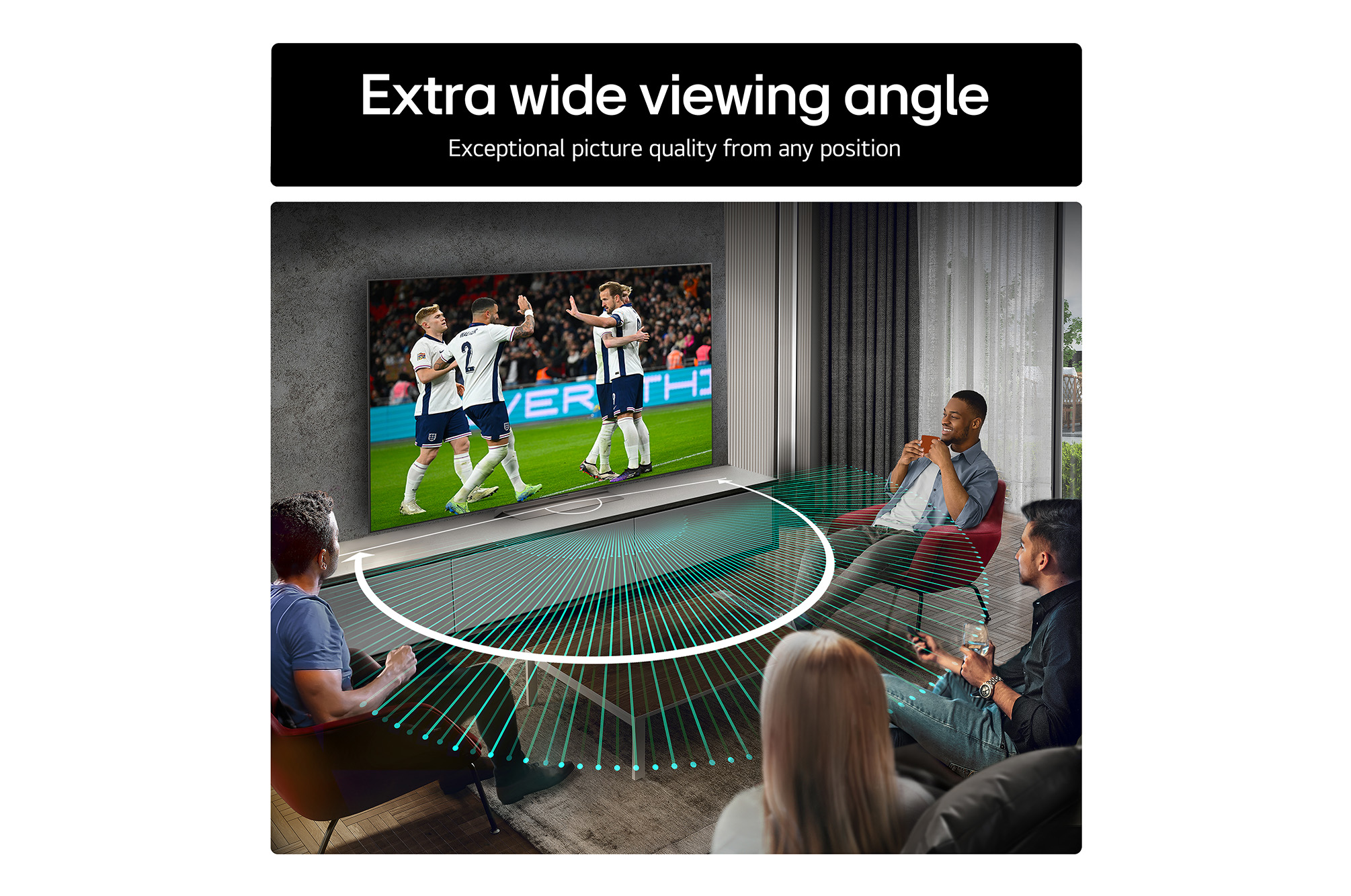 Living room space with a wall-mounted LG OLED TV. On the TV is a mountain range against a dark evening sky filled with stars. This scene is split in half. One side shows a duller, grayer version of the landscape labeled, Non Perfect Black display. On the other side is a more pleasing picture with a larger dynamic range of blacks and whites.